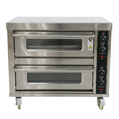 パイ・ロング・ローフ・ベーカリーで,大きなデッキオーブンマシンで円形ココナッツパンを焼くのが簡単になりました