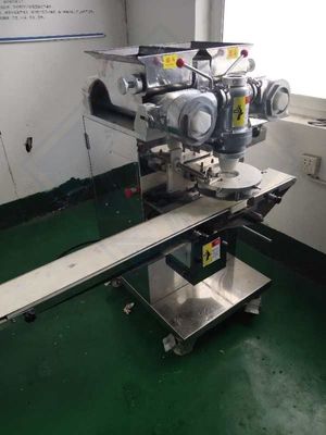 クッキーを詰める機能を持つ自動インクロスタッティングマシン